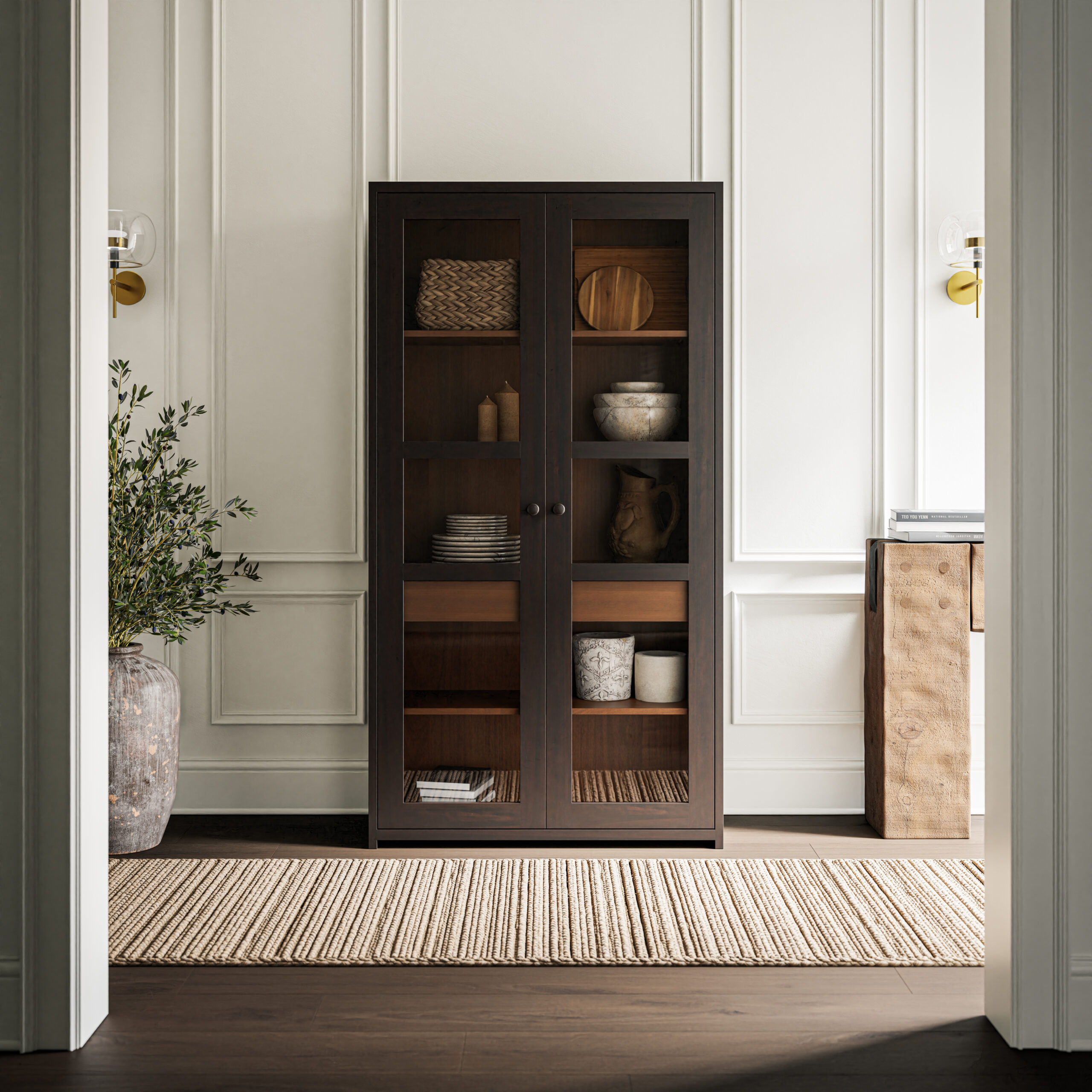 Amish-handcrafted furniture in Mt. Cory—dark wood display cabinet styled in a bright, modern room.